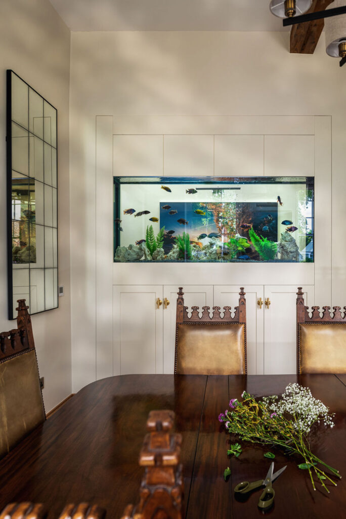 In wall aquarium- Grade Listed Property Renovation by Katie Malik Design Studio