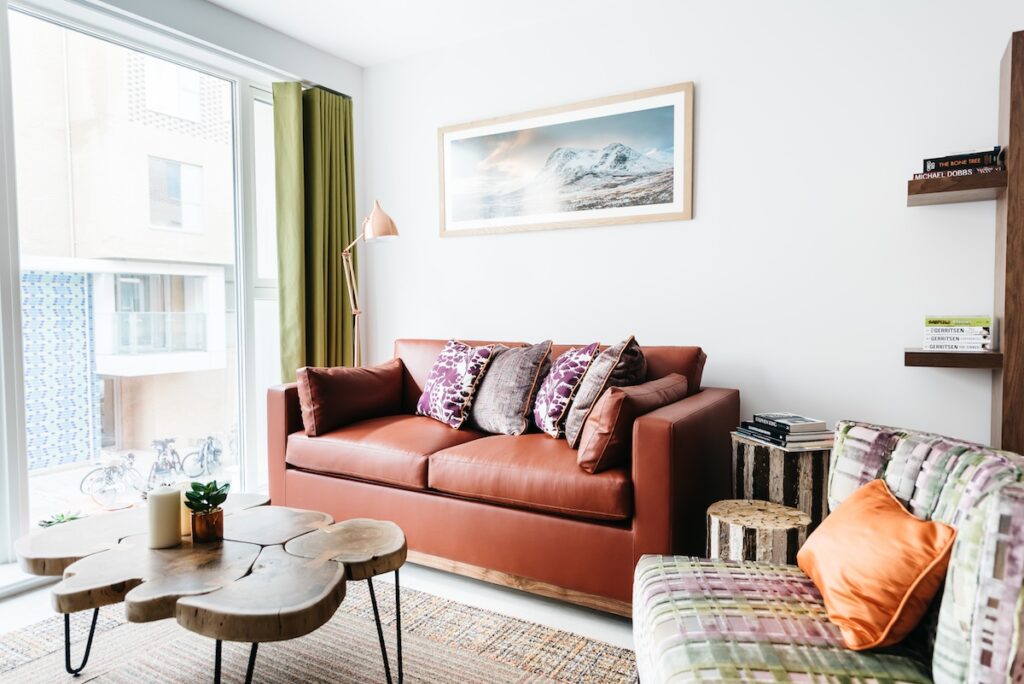 New built living room by Katie Malik Design Studio